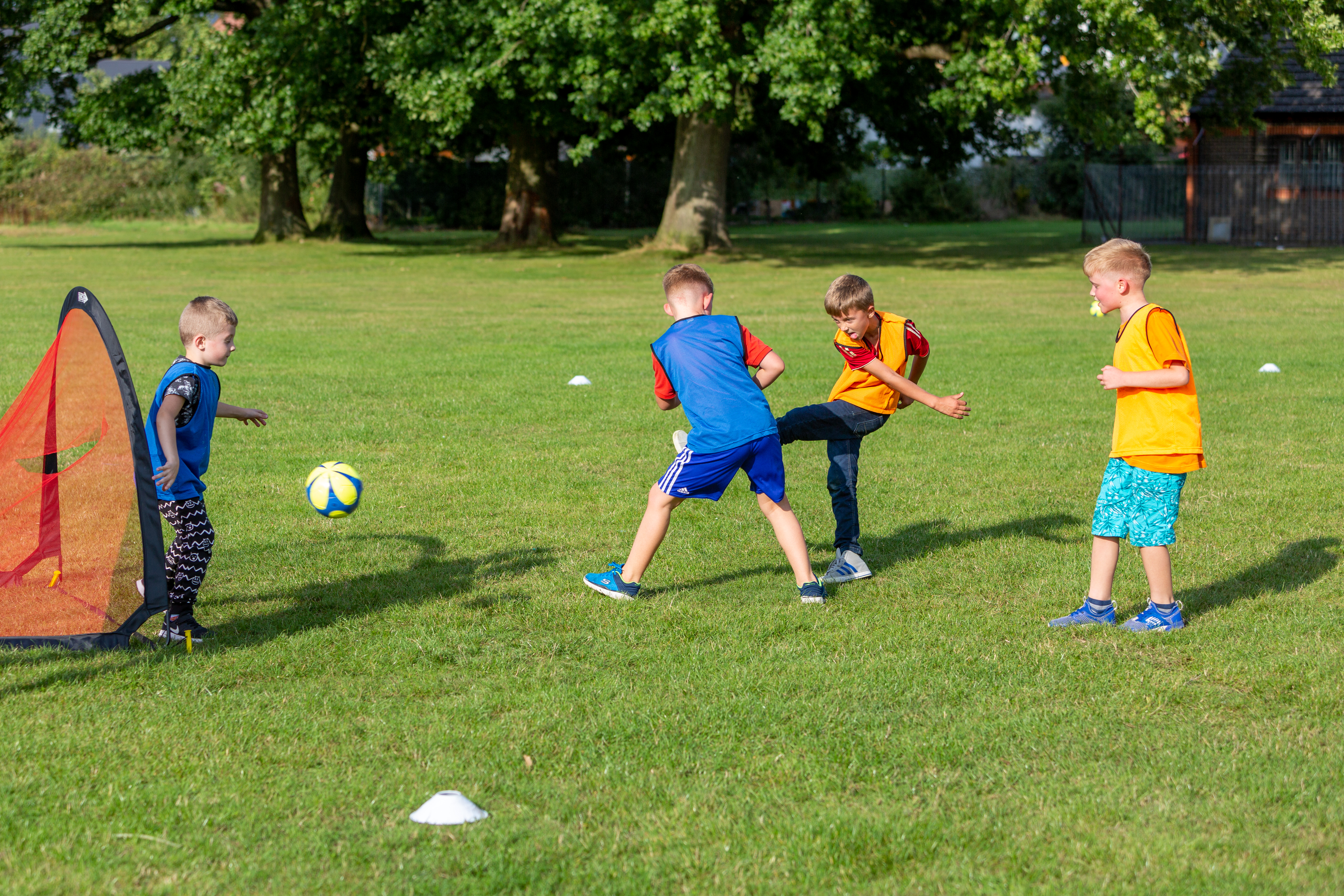 Young people playing football