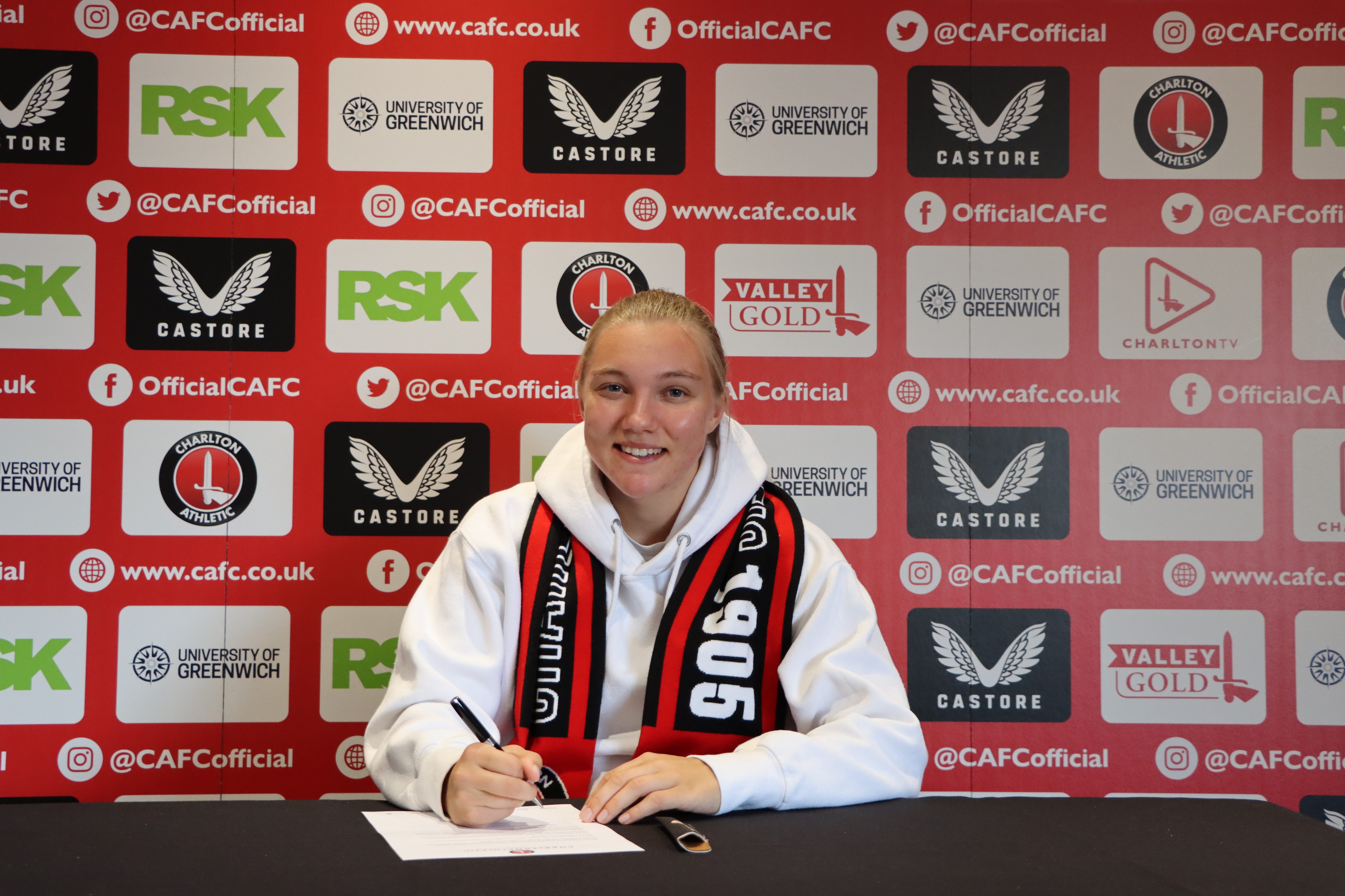 Kiera Skeels smiles at the camera after penning a new deal with Charlton