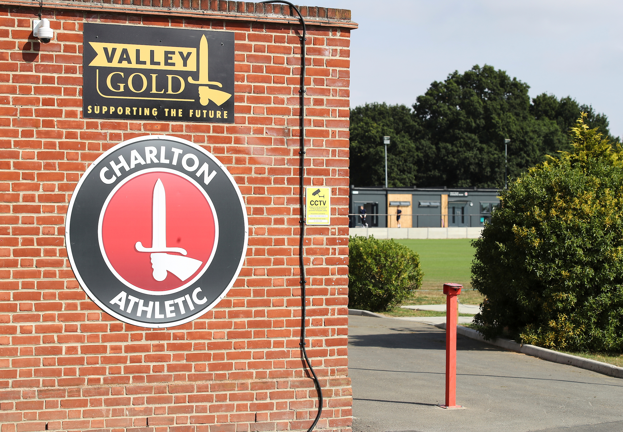Valley Gold logo above Charlton badge