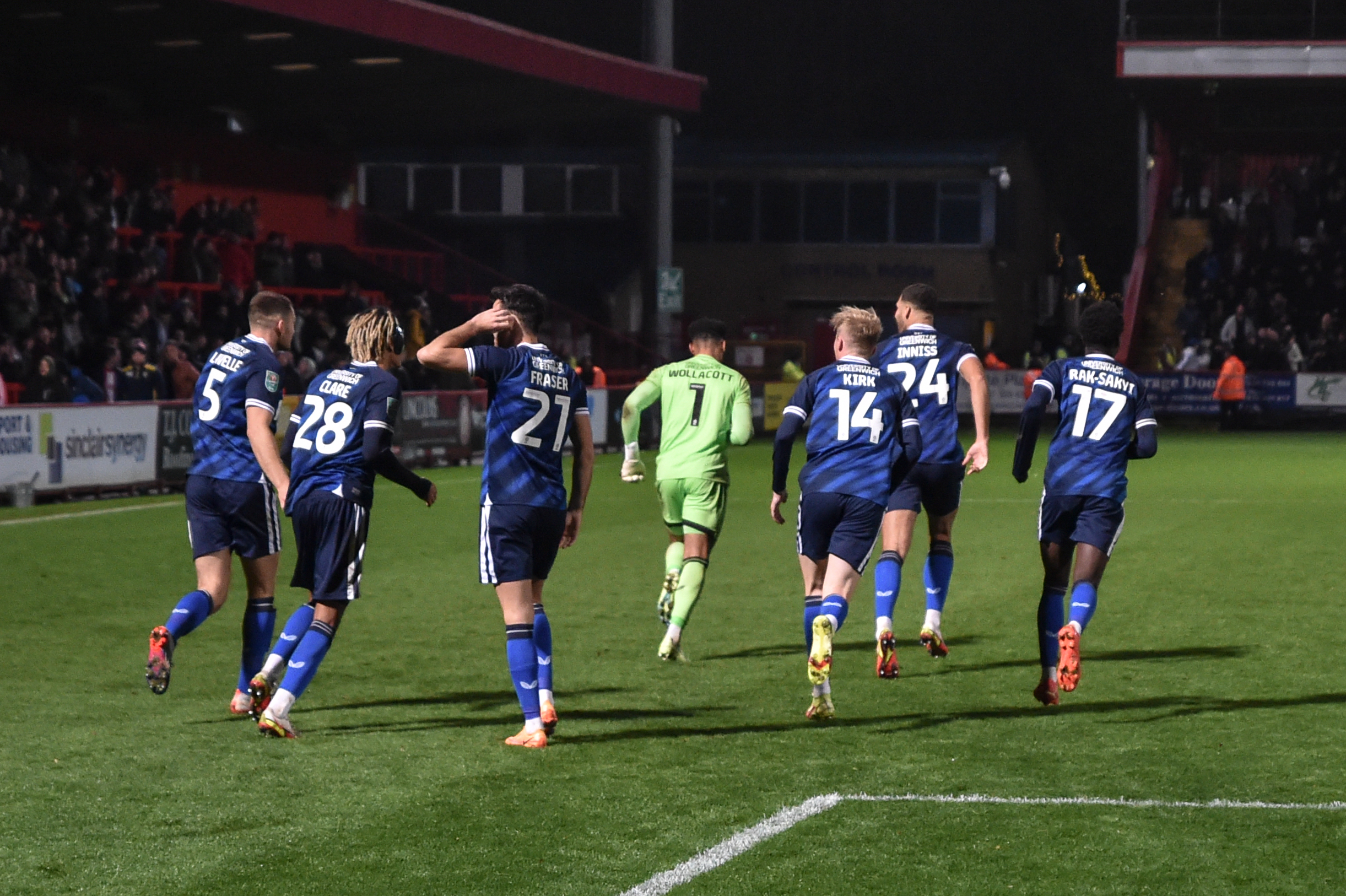 The Addicks celebrate following Fraser's decisive spot-kick