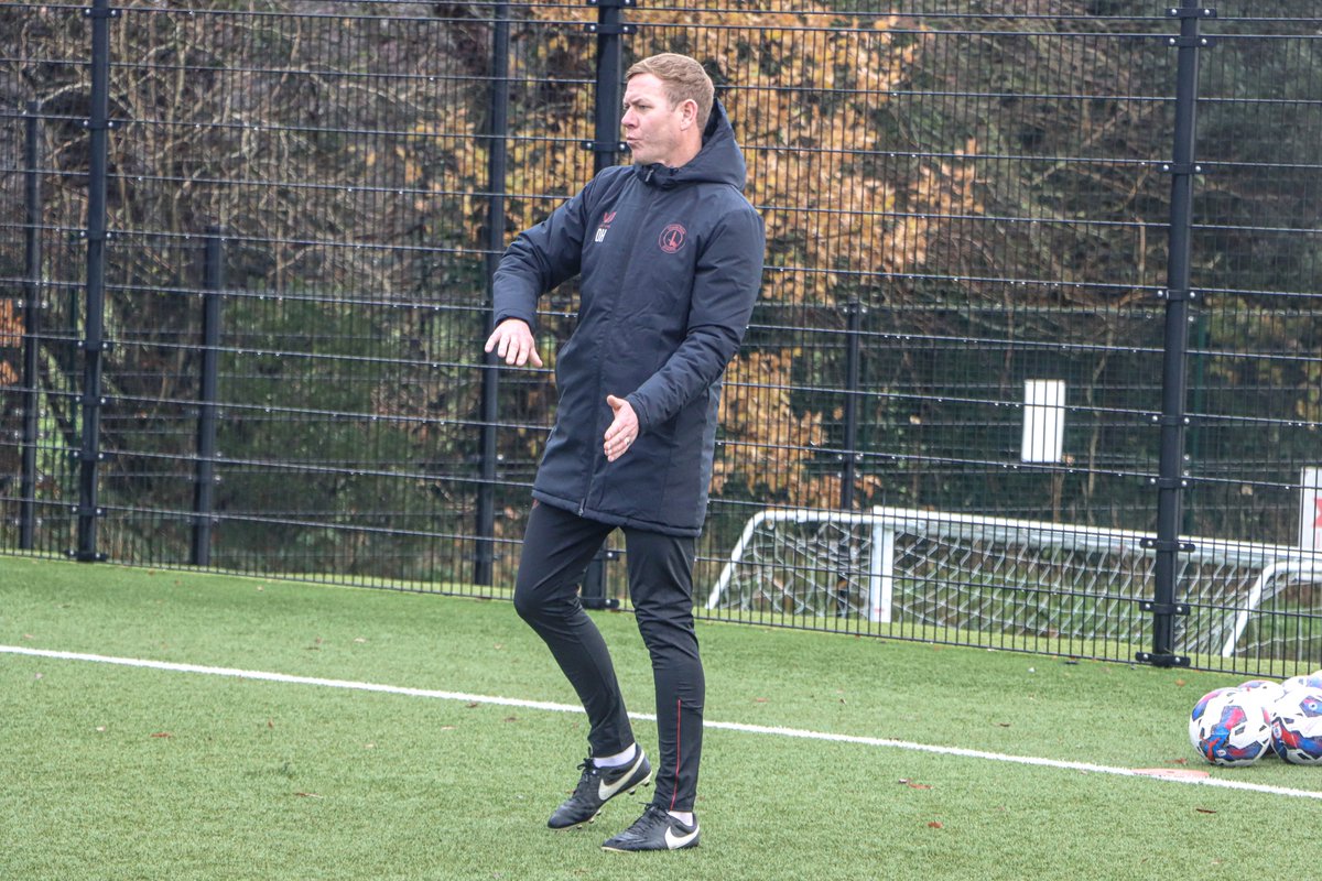 Dean Holden coaching in Charlton kit