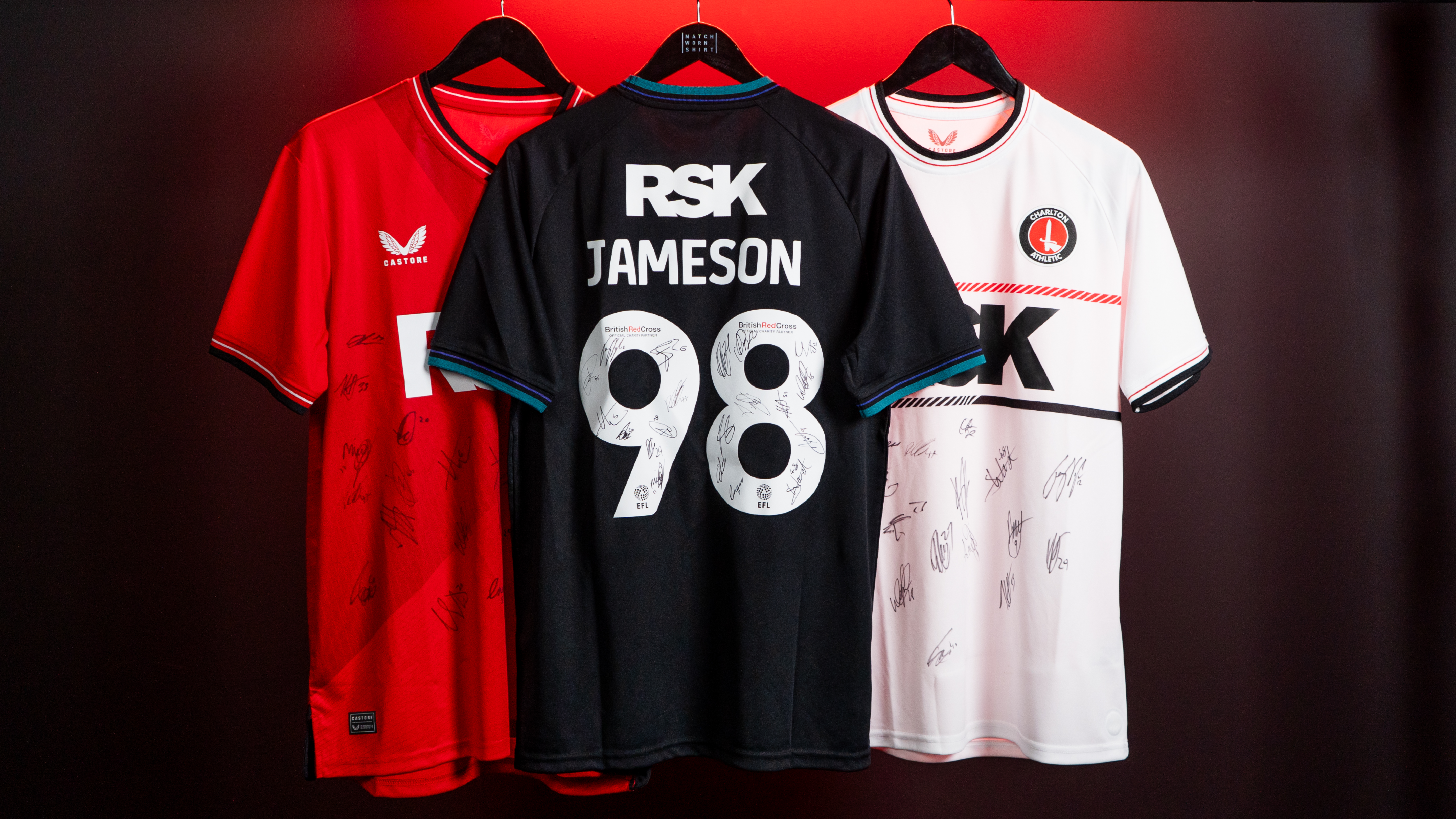Home, away and third shirts signed by the men's first-team squad.