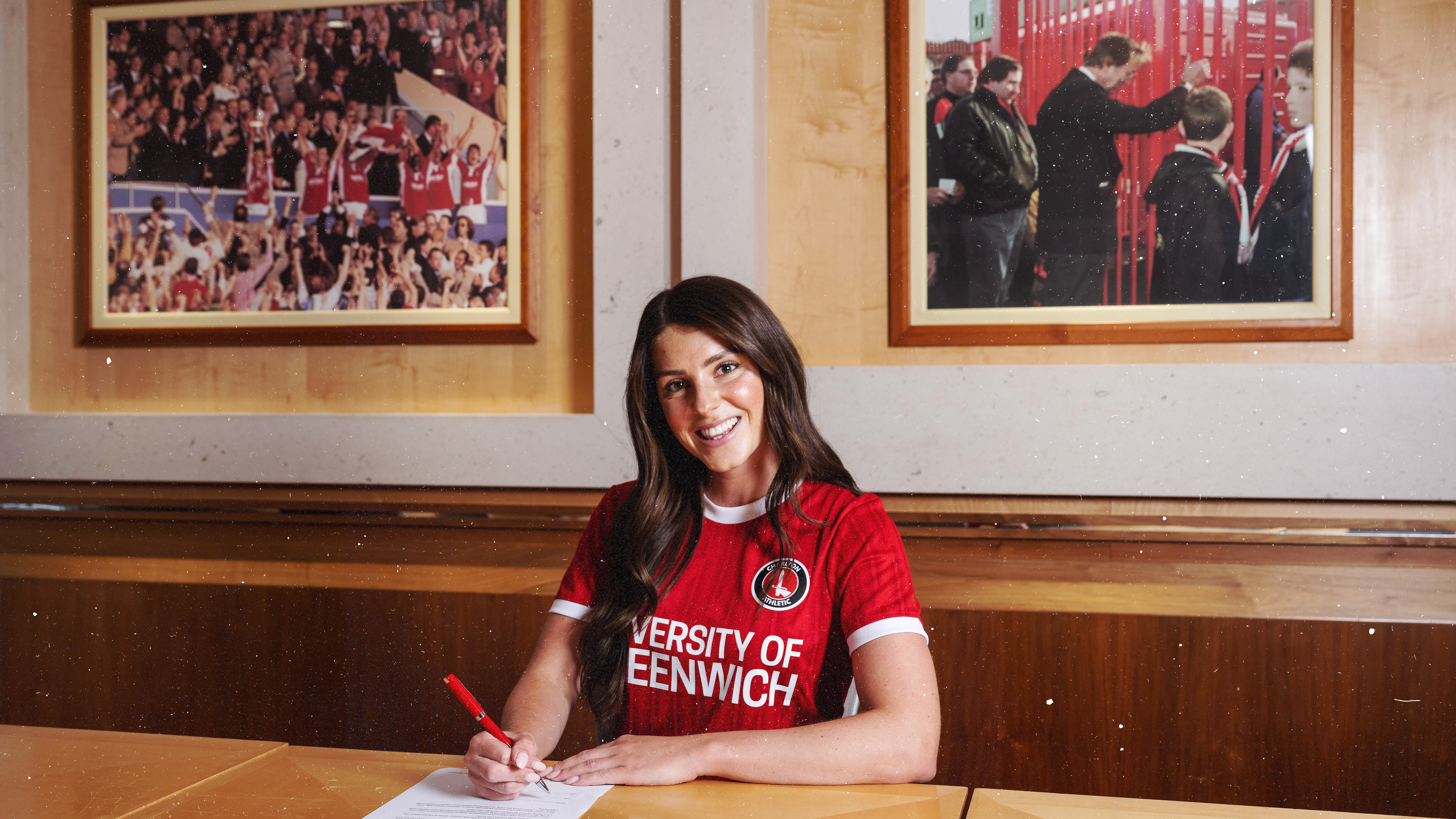 Carla Humphrey signing her contract