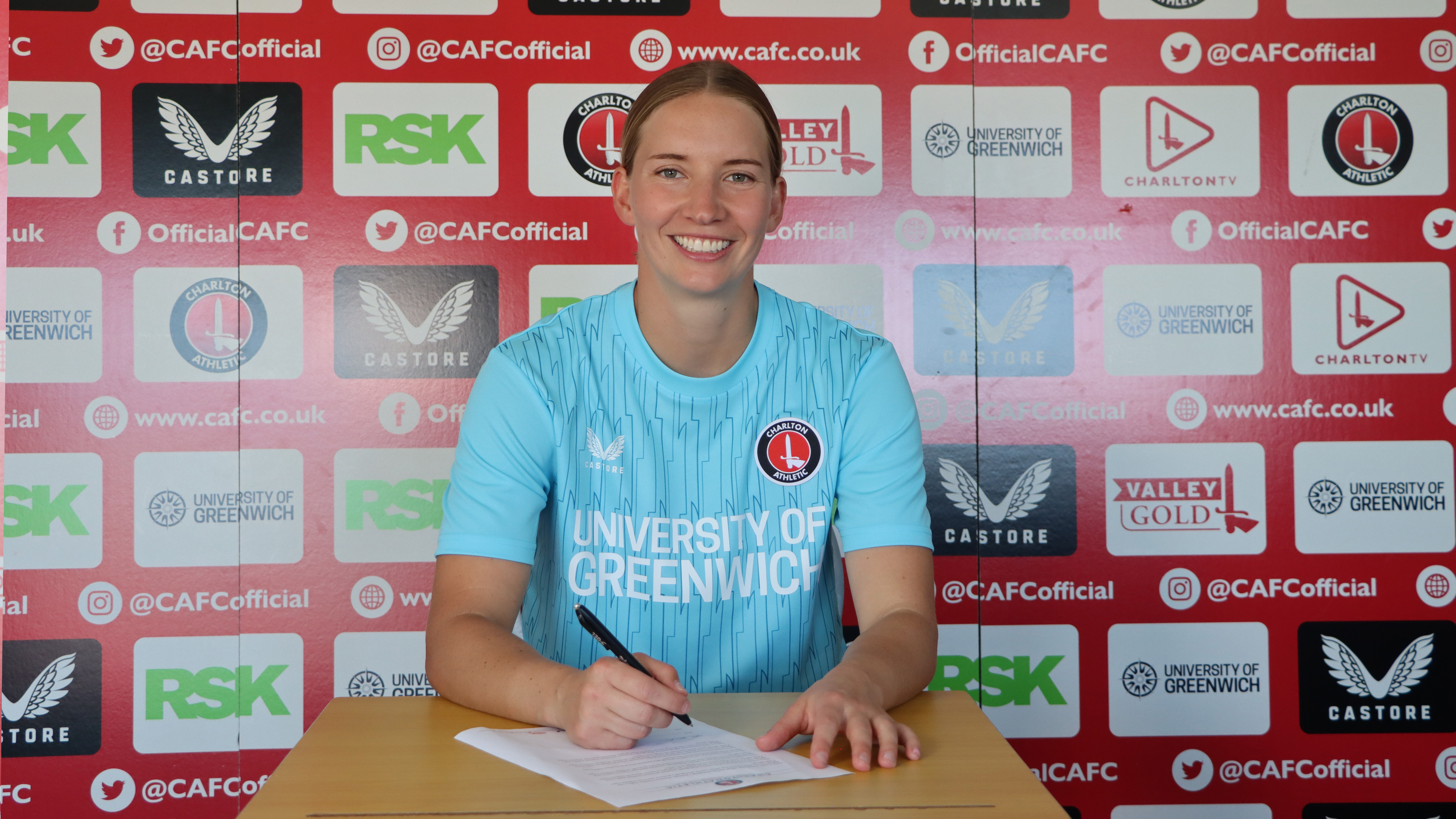 Sophie Whitehouse signing contract