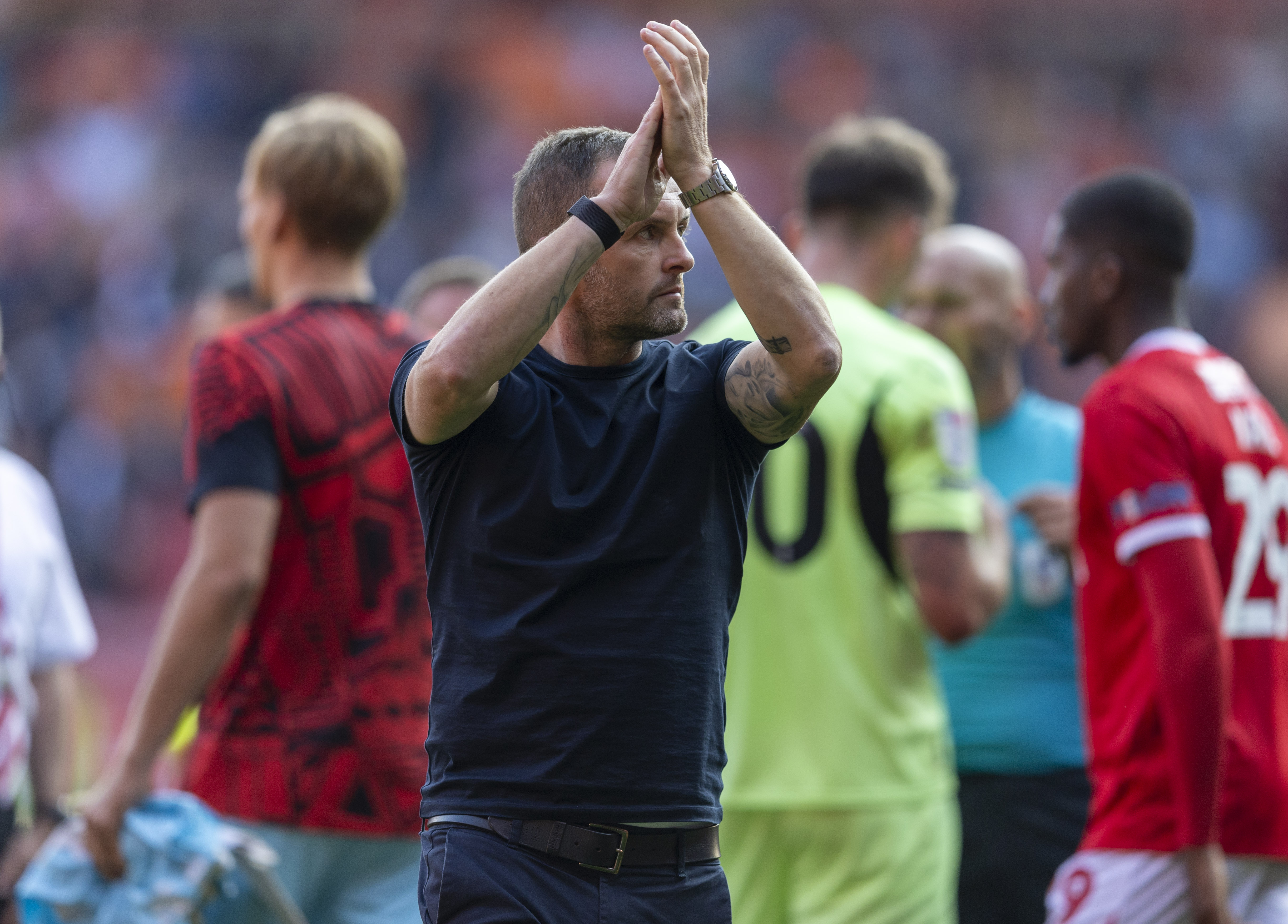 Nathan Jones claps supporters