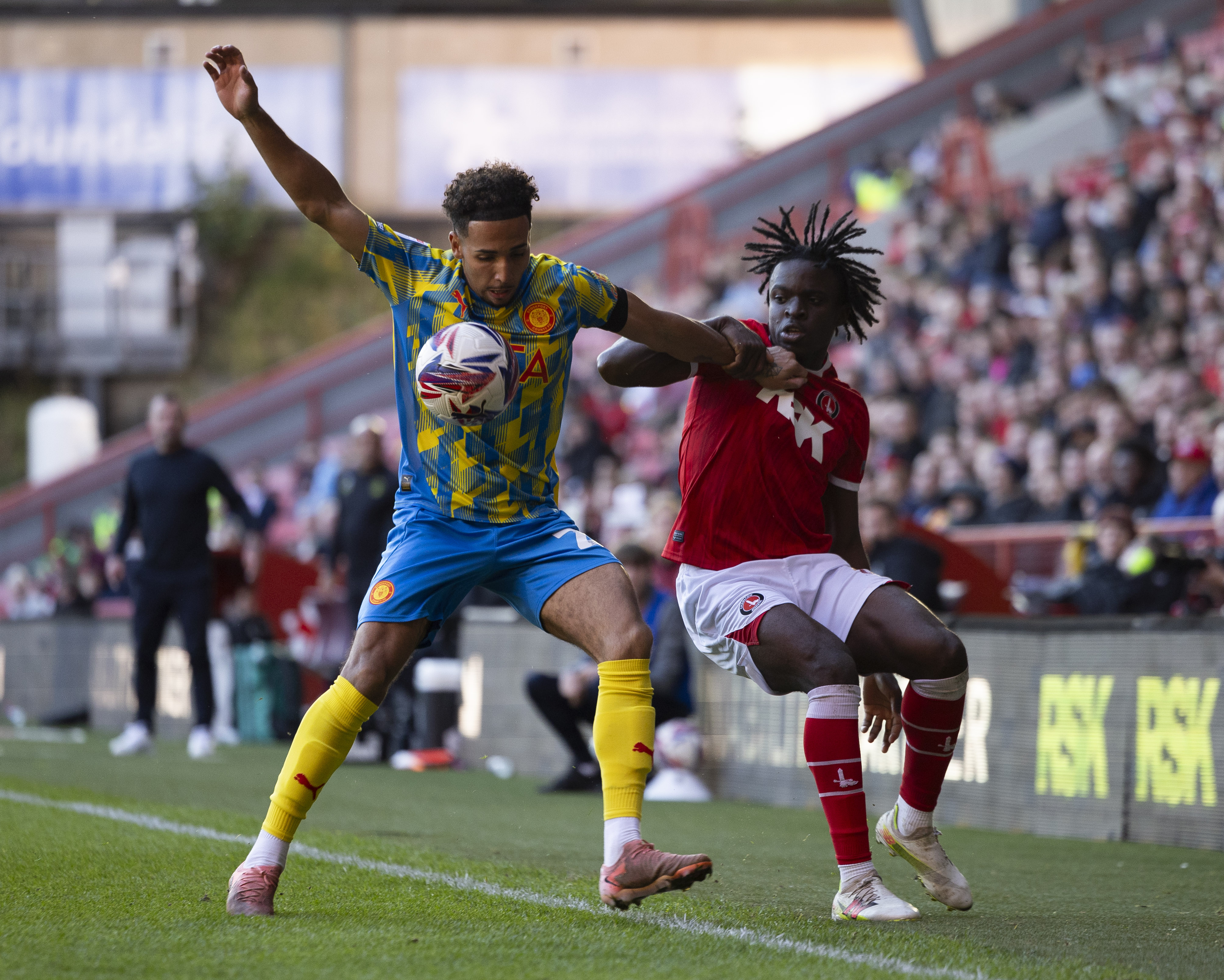 Tyreece Campbell battles for the ball