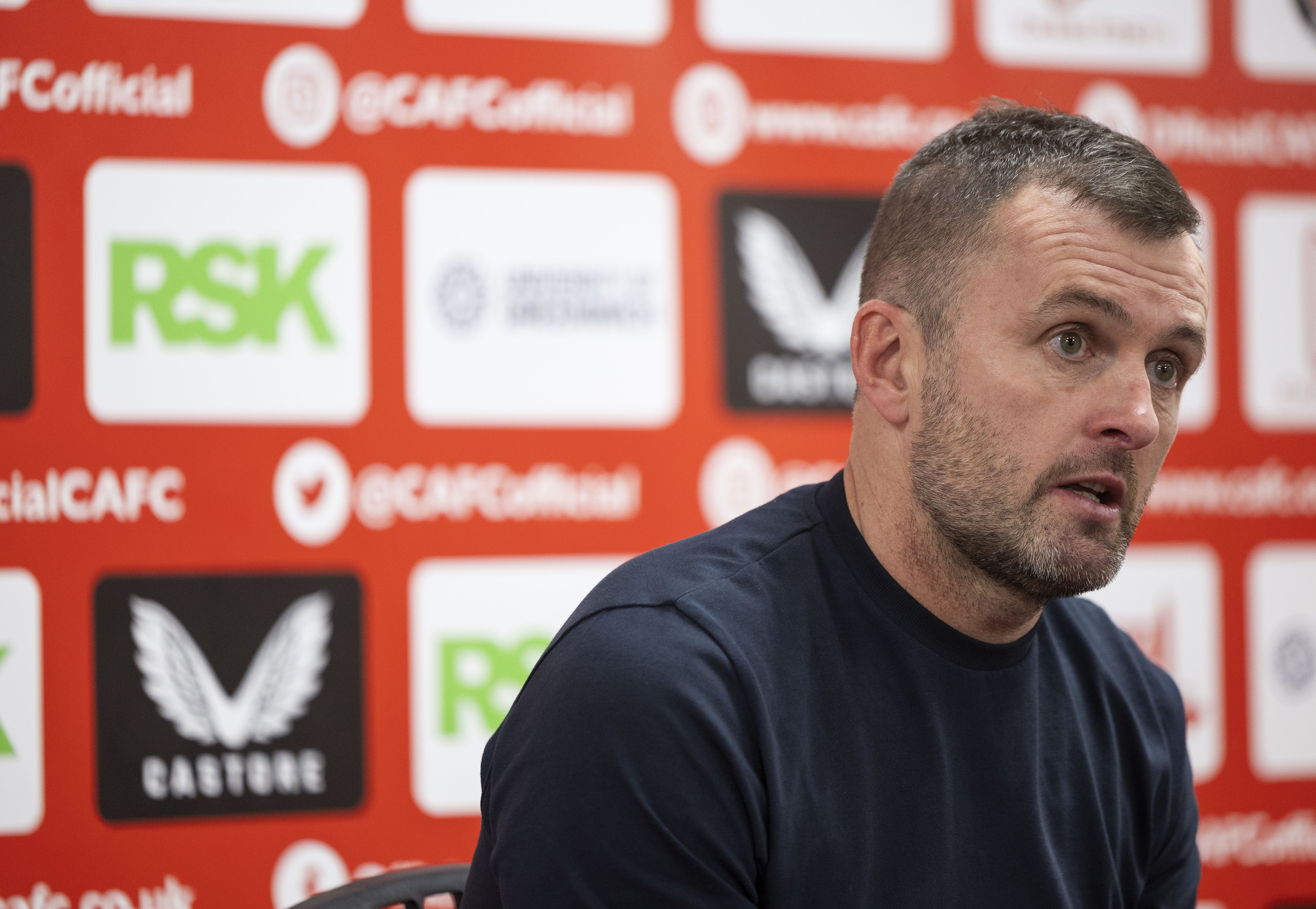 Nathan Jones speaks to the press