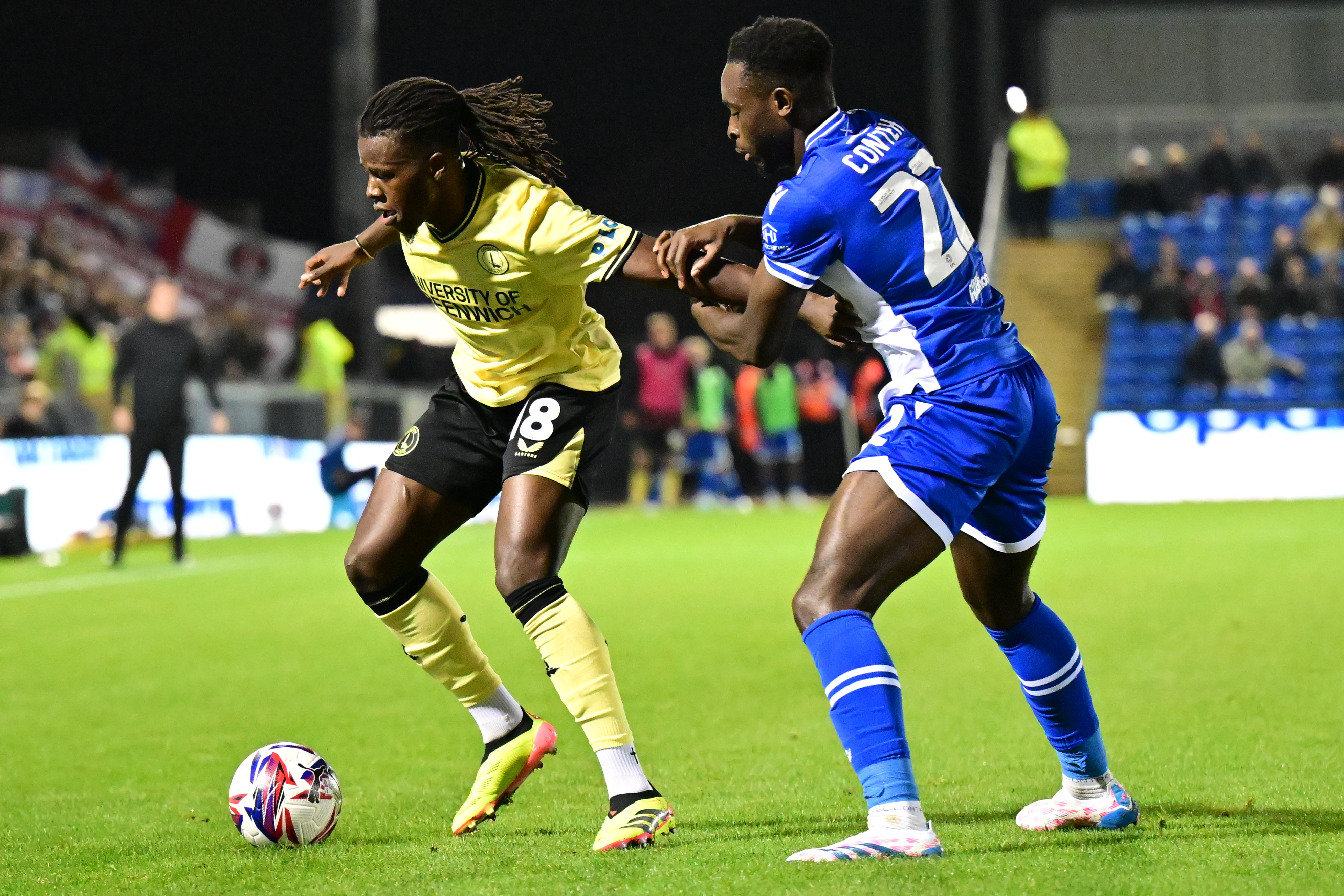 Charlton battle for the ball