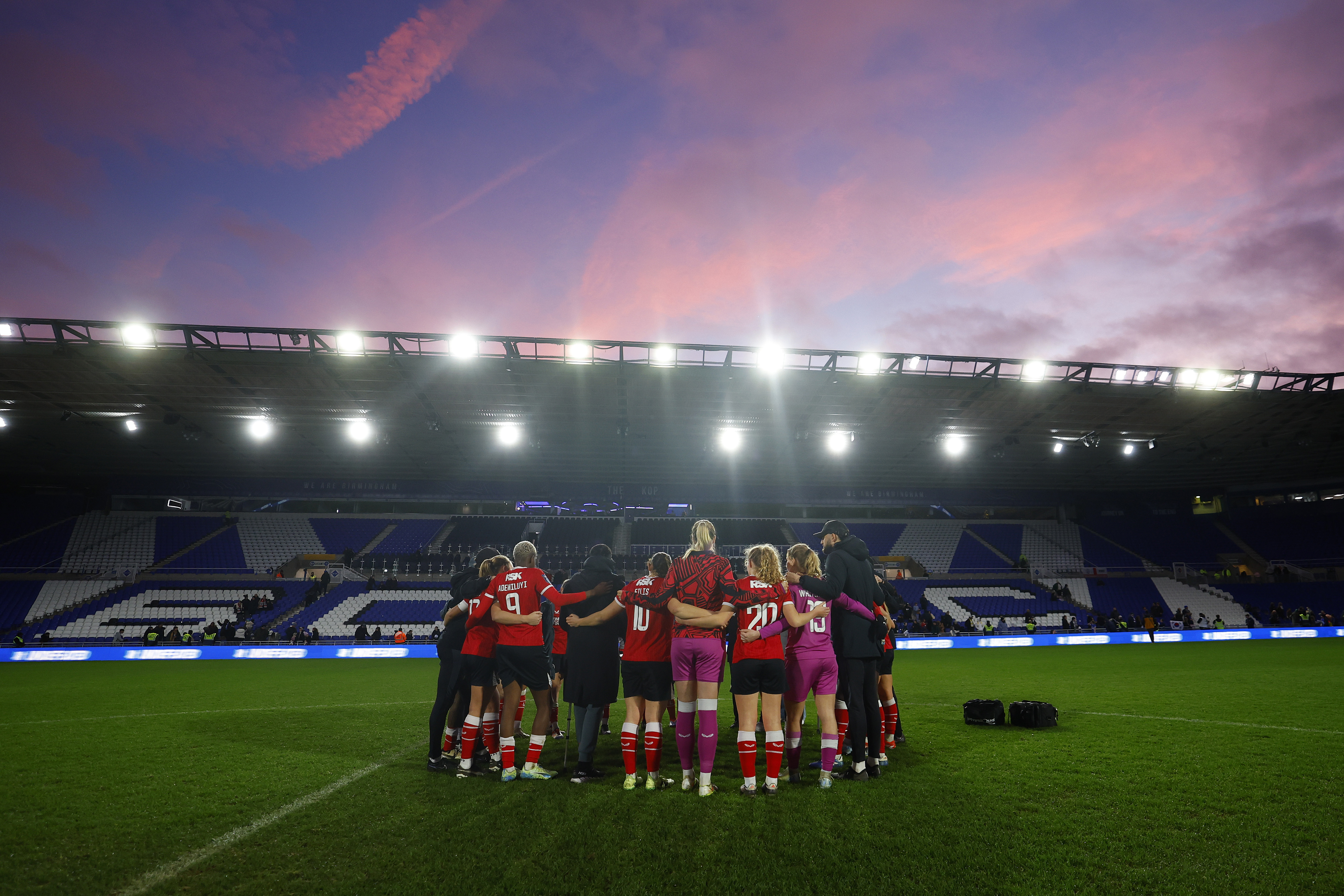 Group huddle at St Andrews