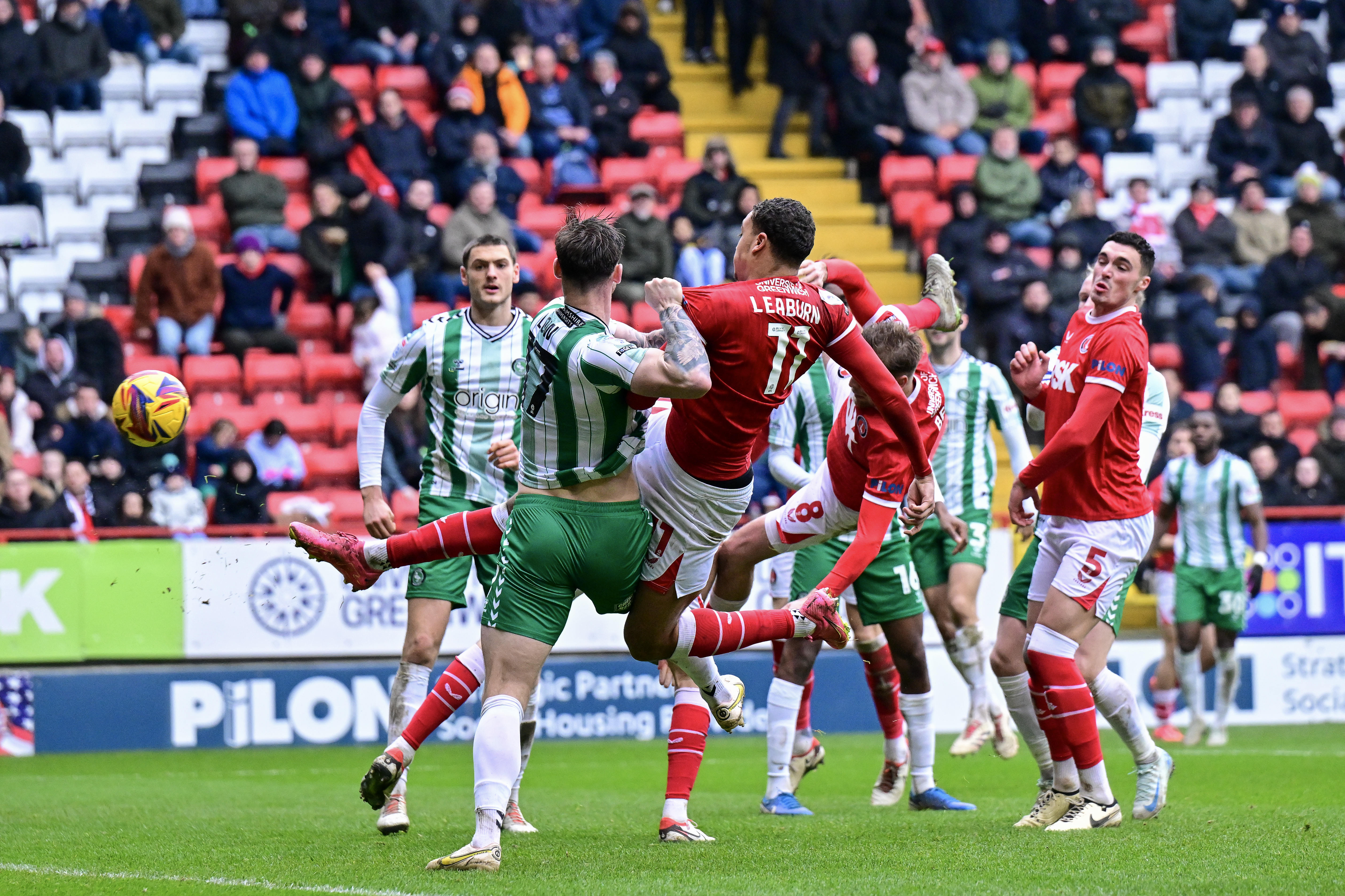 Miles Leaburn shoots at goal for Charlton's first