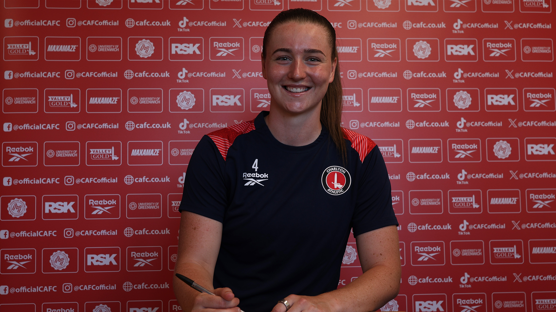 Mia Ross signing contract