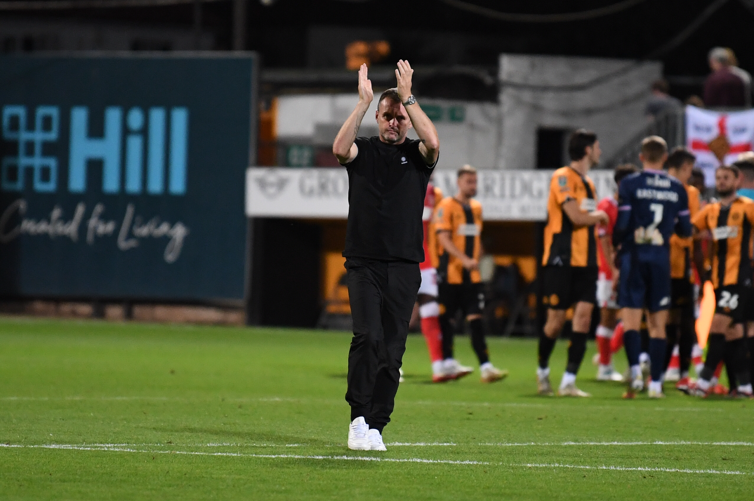 Nathan Jones claps supporters