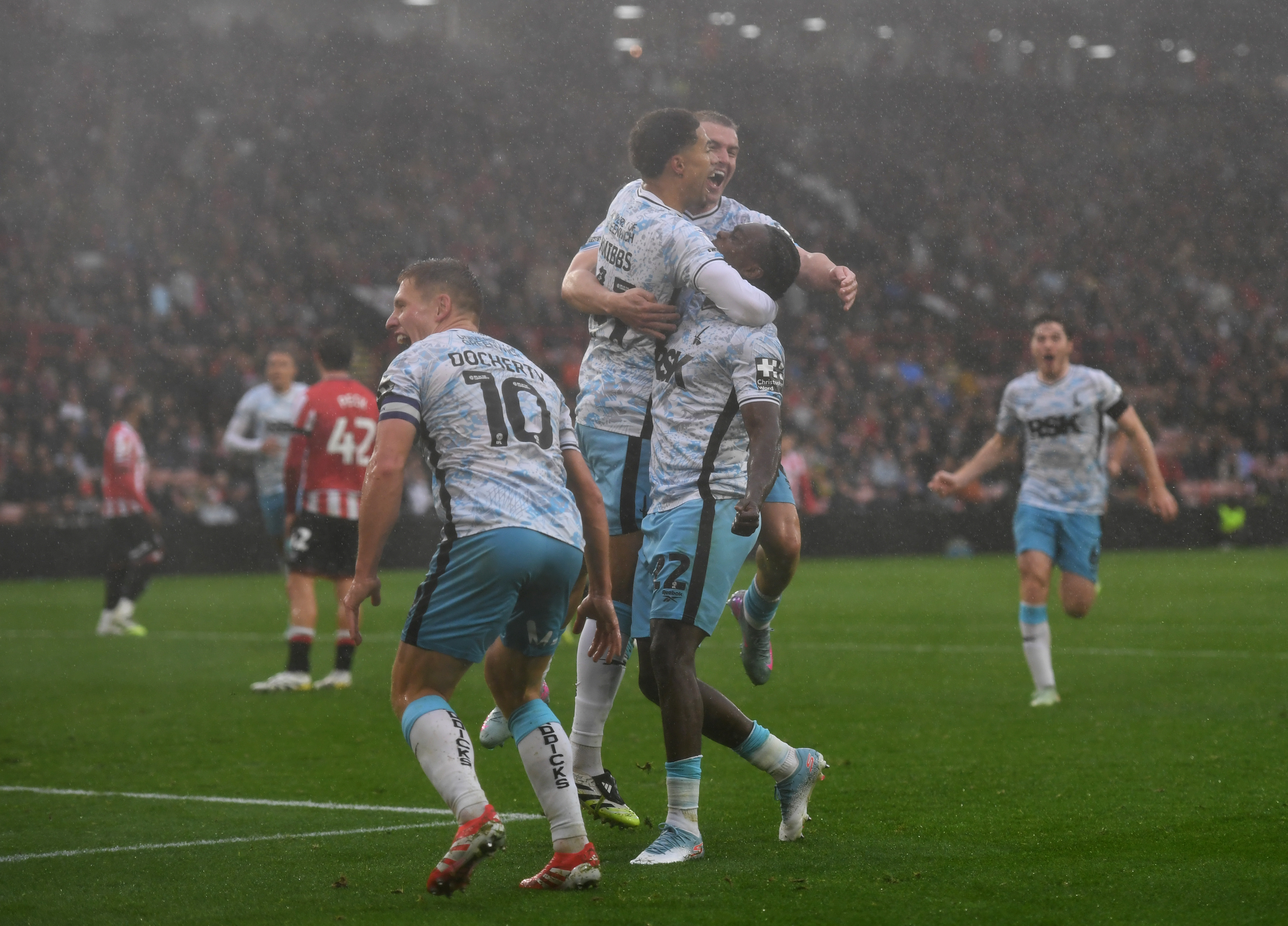 Tanto Olaofe celebrates