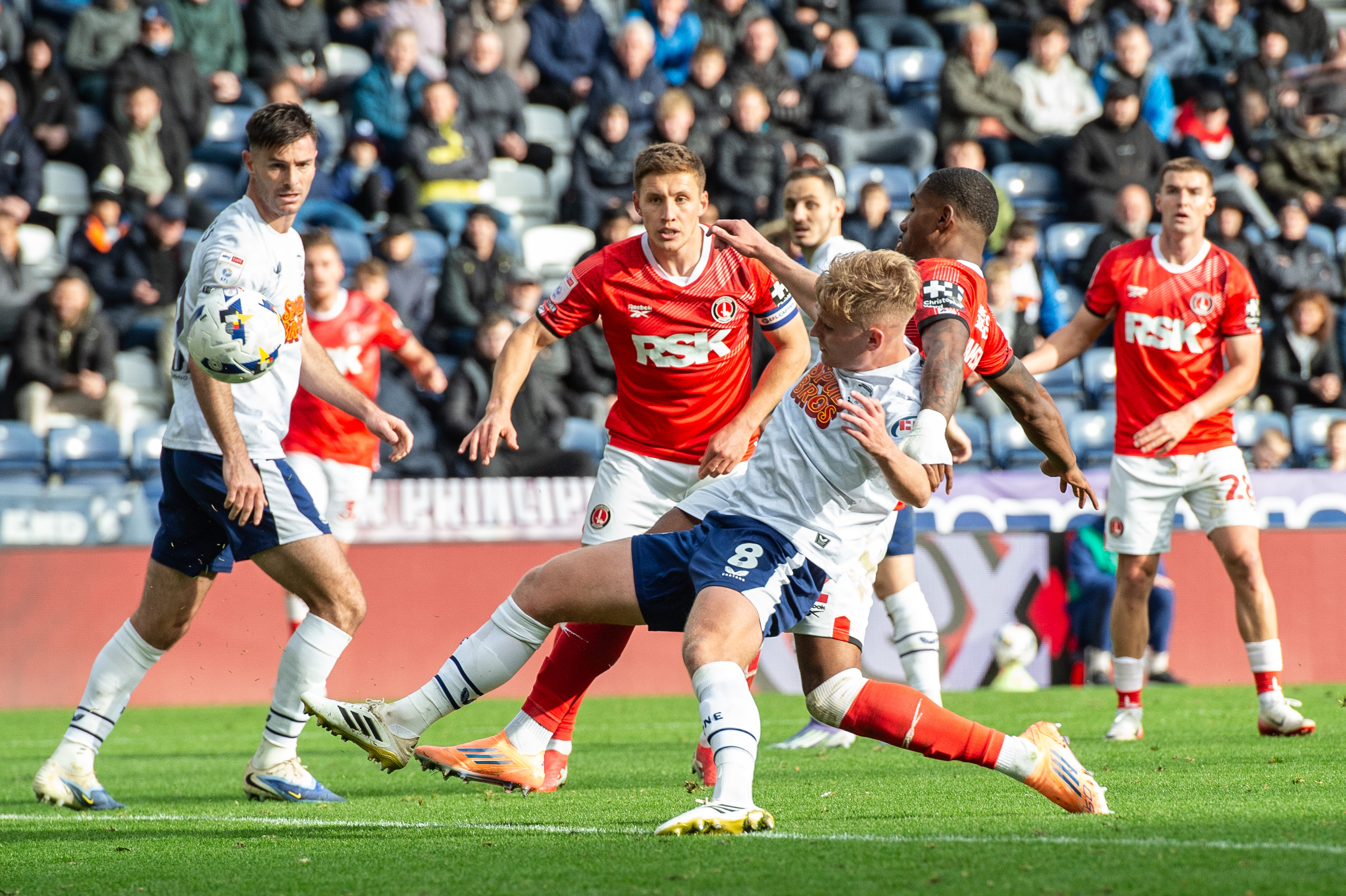 Charlton battle for the ball