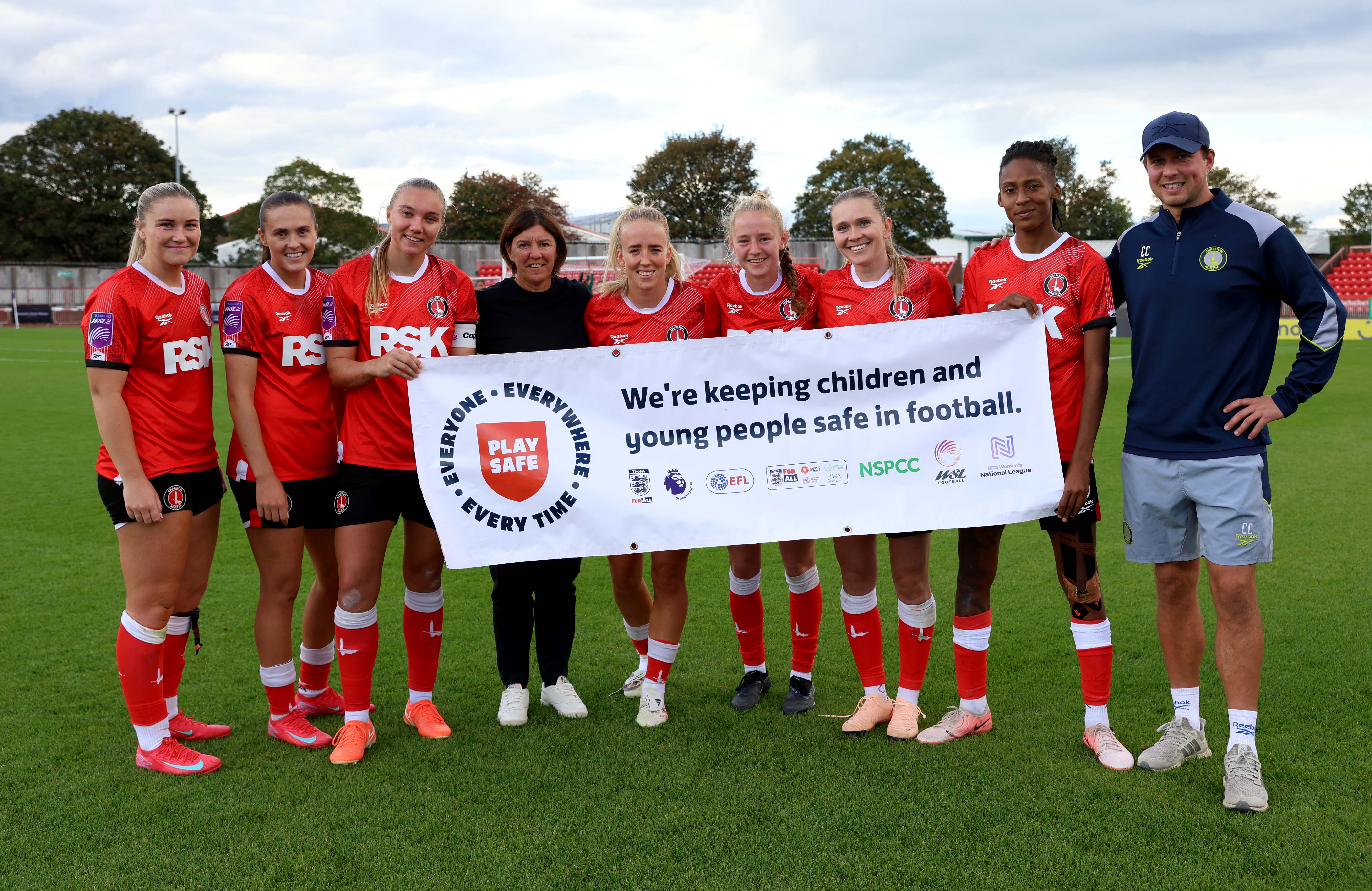 Charlton Athletic Women hold up Play Safe banner