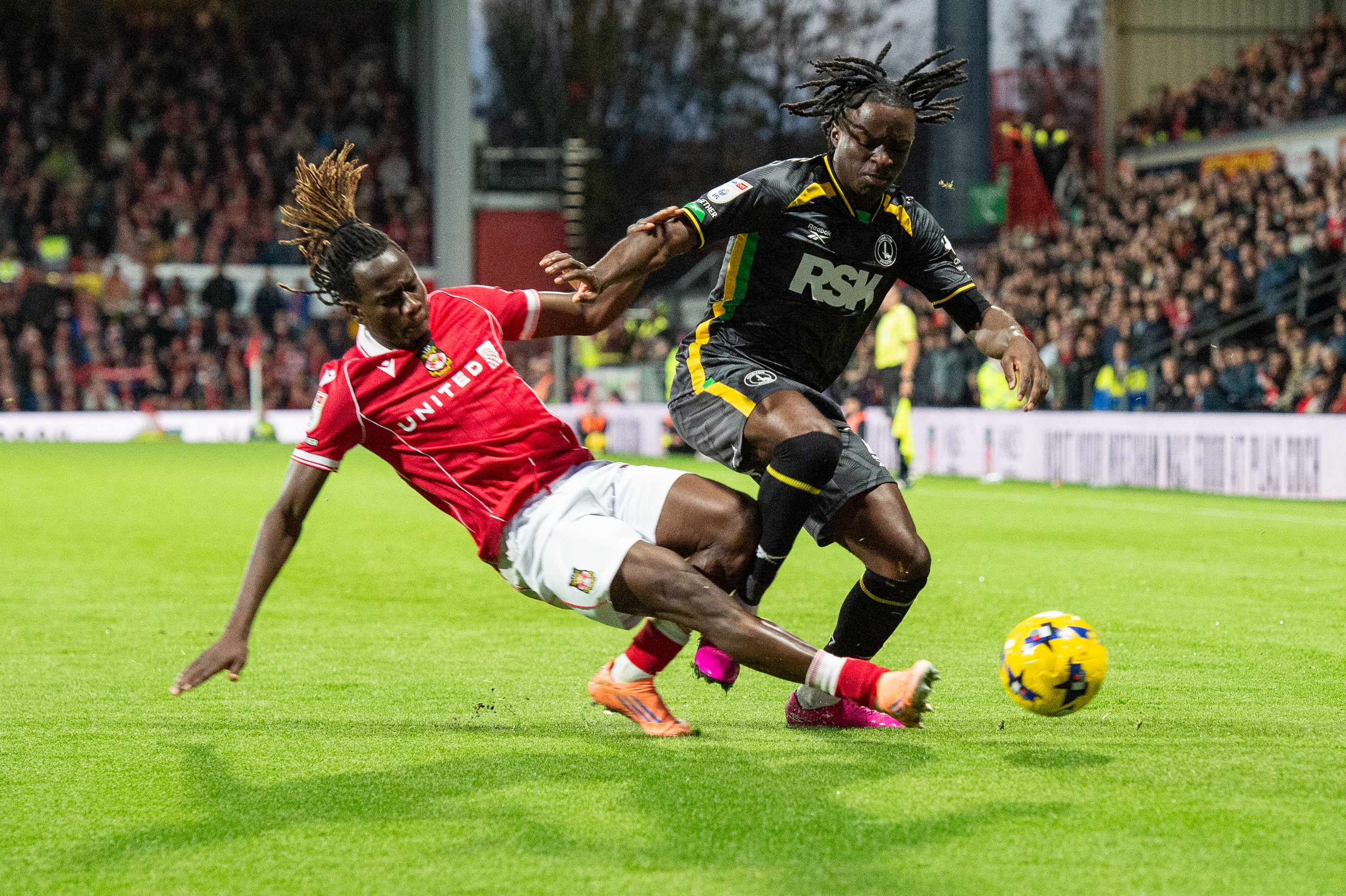 Charlton battle for the ball