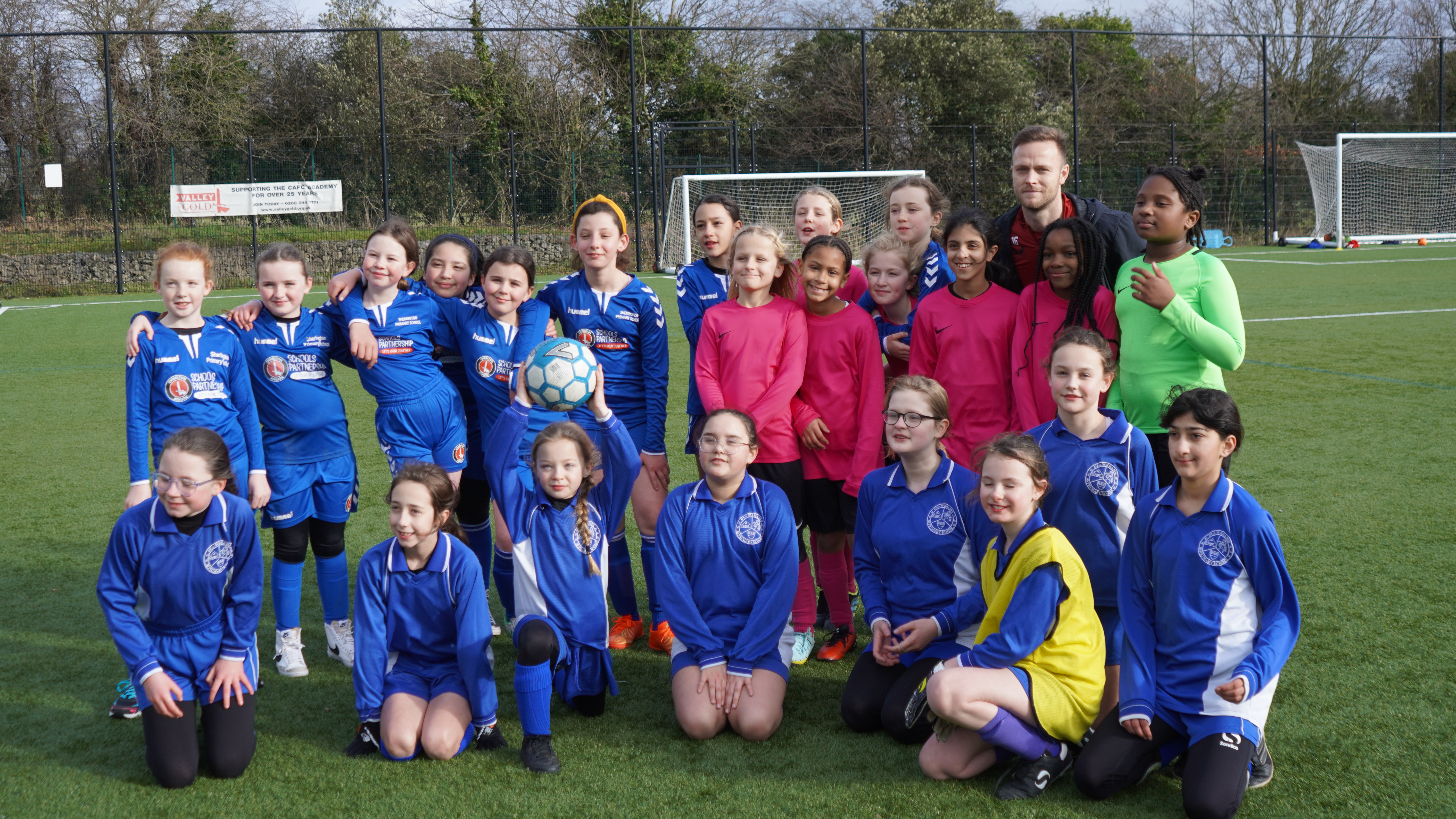 Todd Kane visiting a girls football tournament