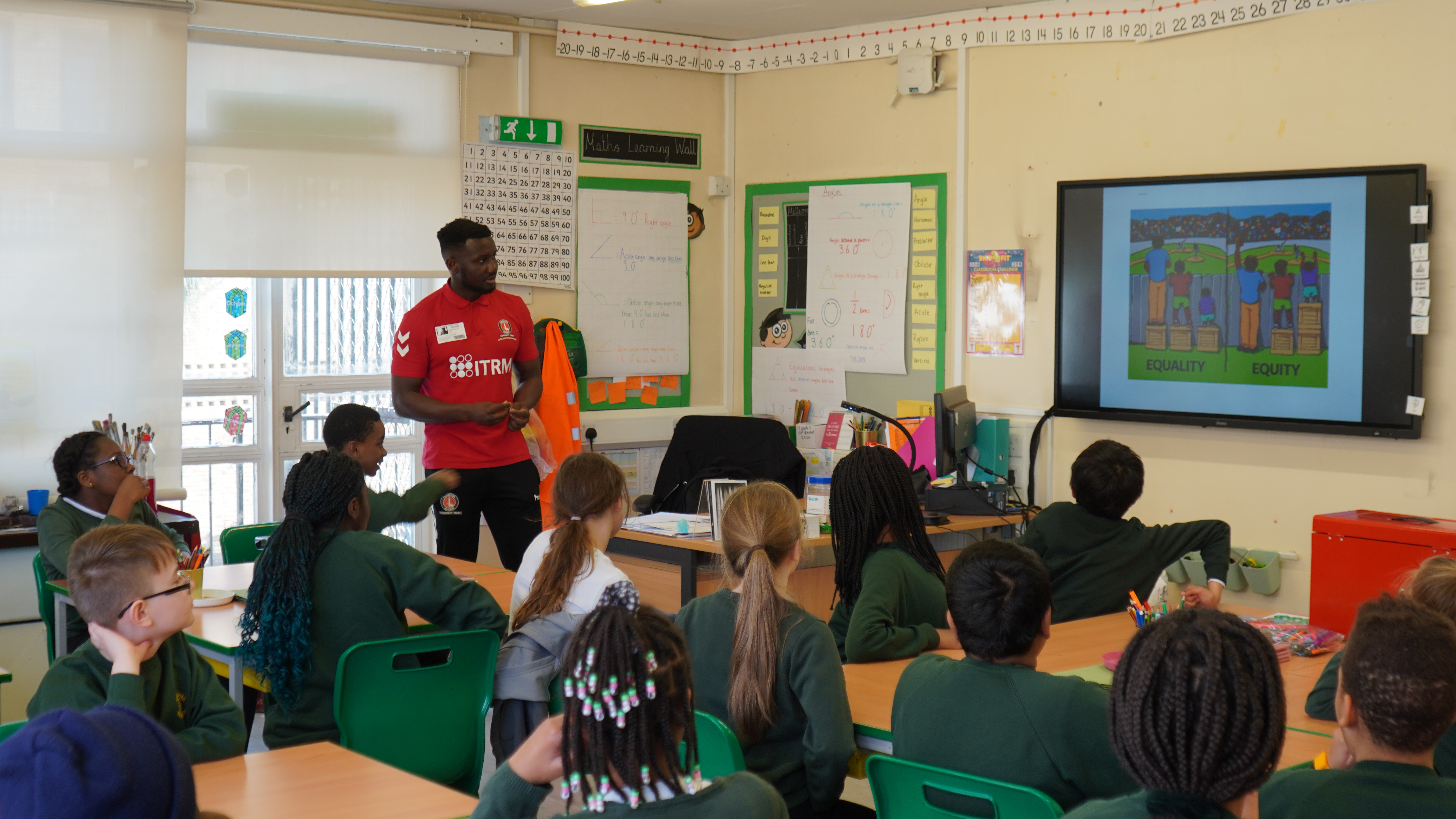 CACT staff member delivering a session to young people