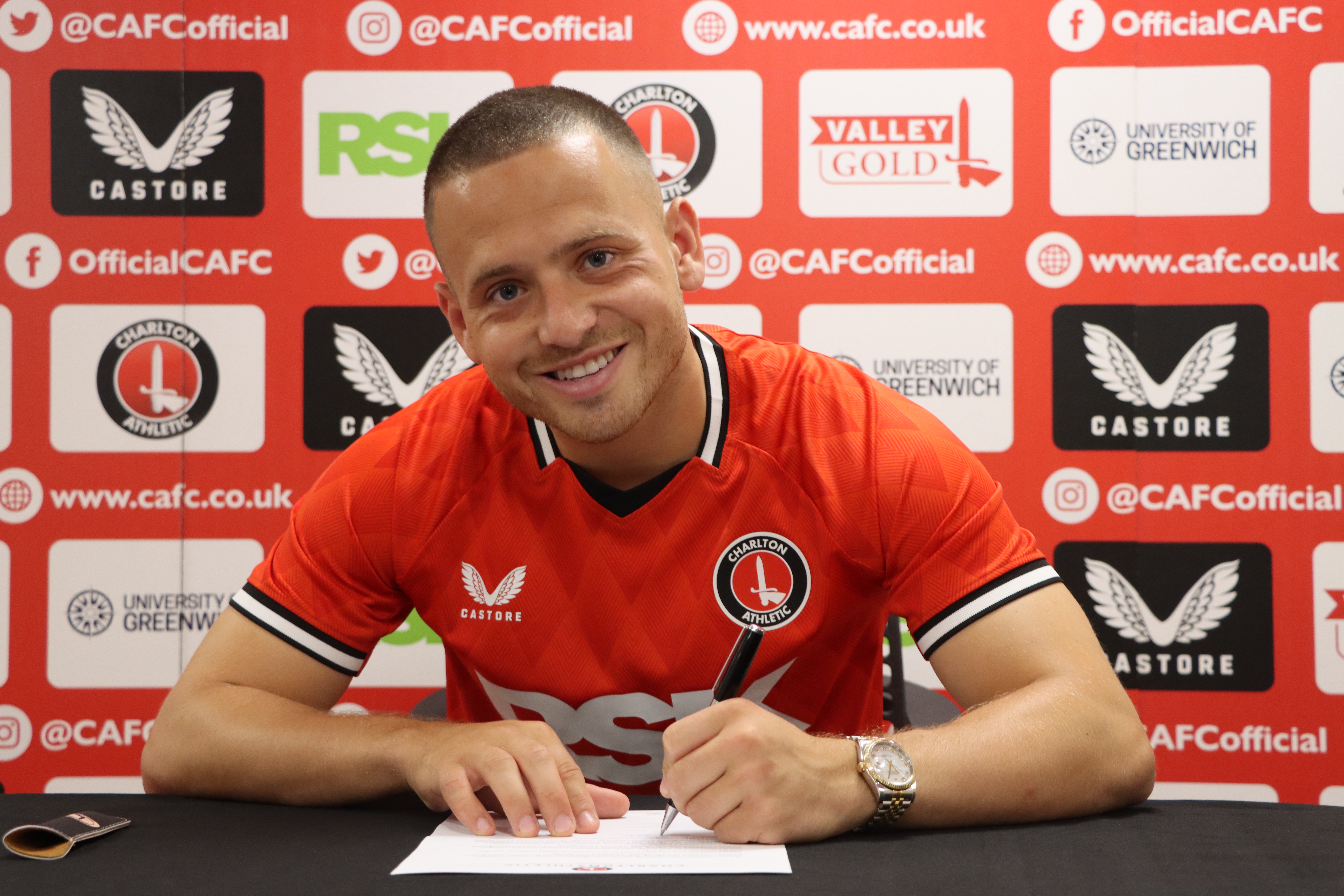 Jack Payne signs his Charlton contract