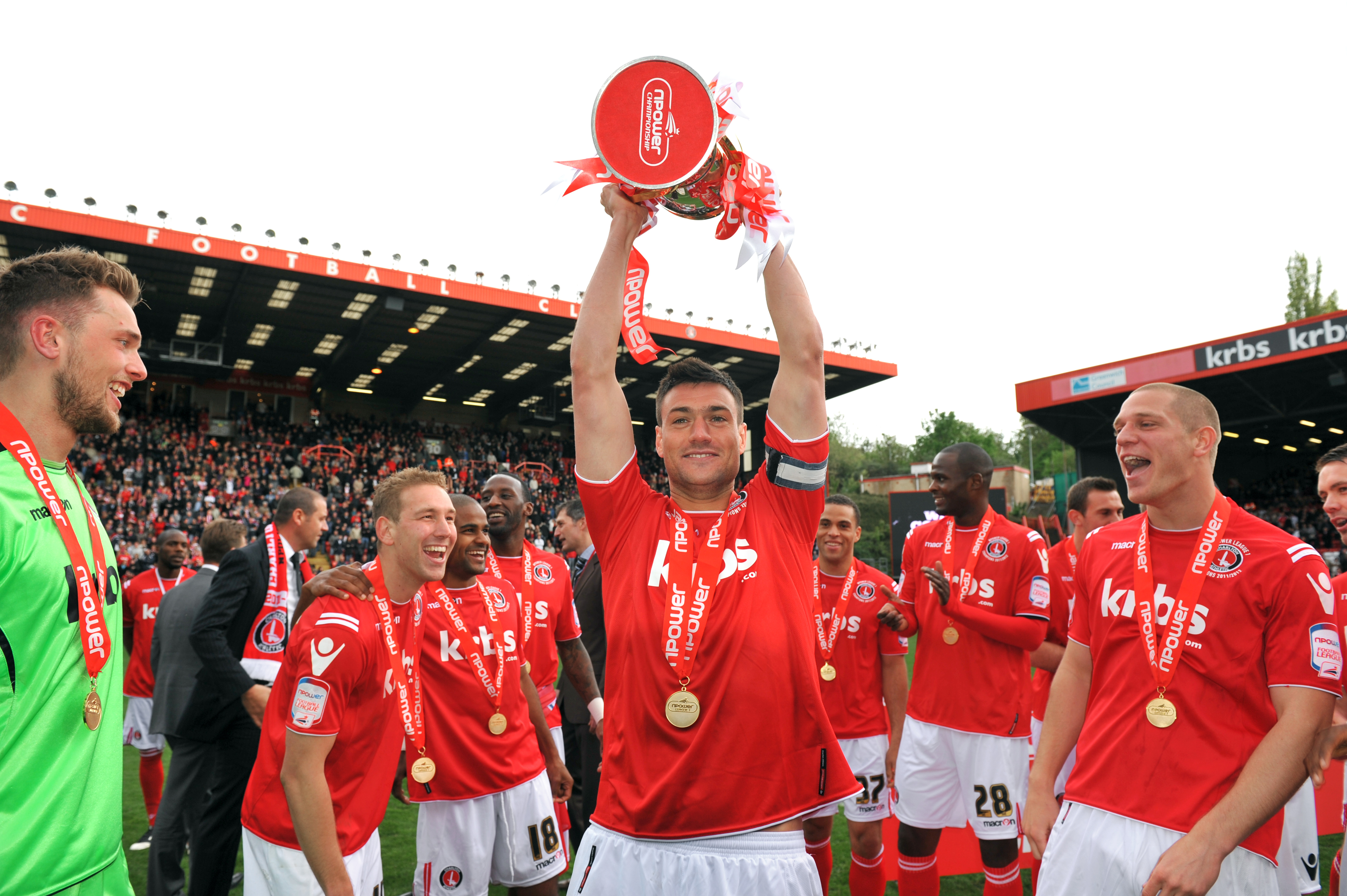 Johnnie Jackson lifts the League One trophy