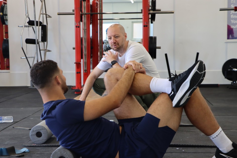 Ben Garner chats to Ryan Inniss in the gym
