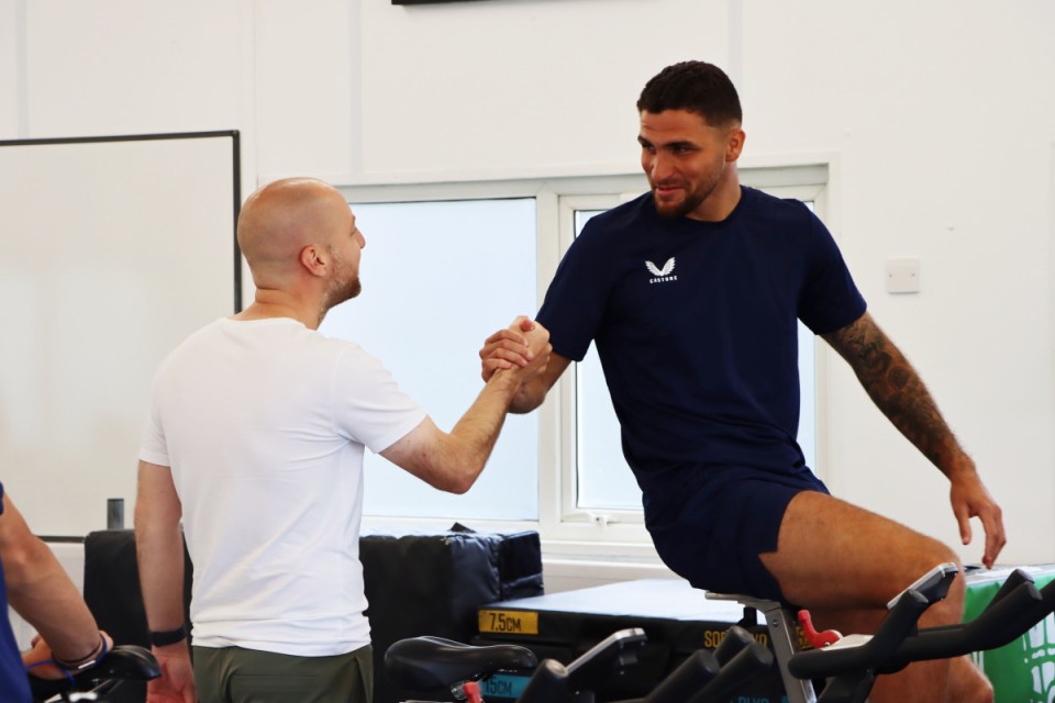 Ben Garner shakes hands with Ryan Inniss