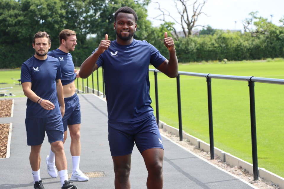 Diallang Jaiyesimi puts his thumbs up to the camera