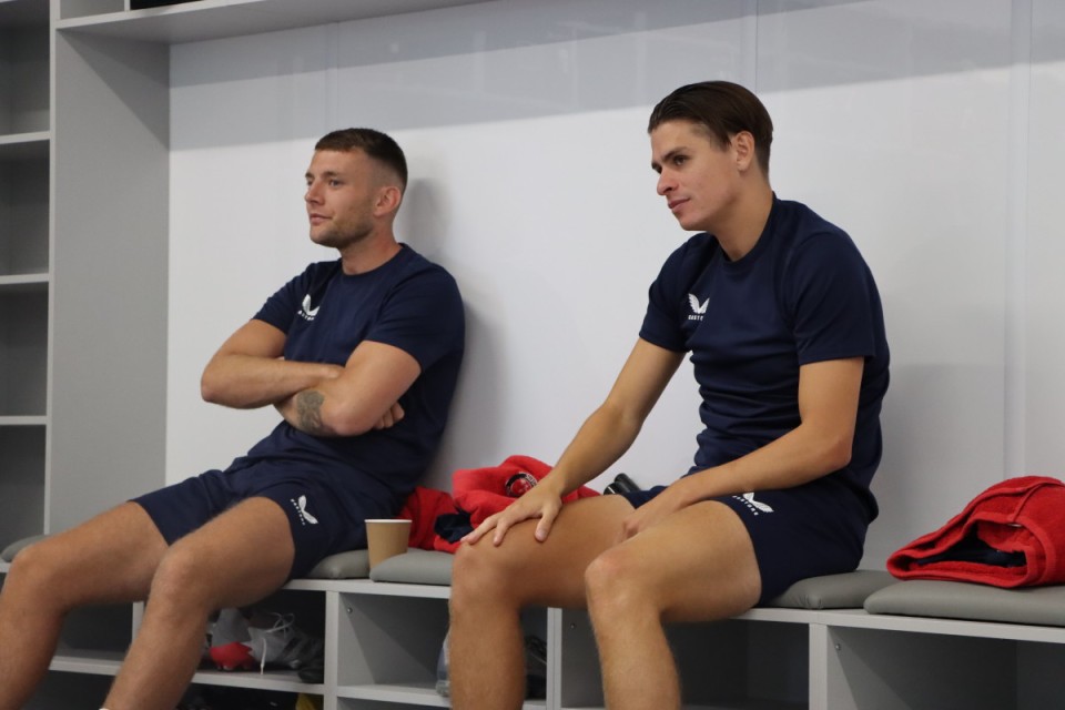 Sam Lavelle and George Dobson in the dressing room