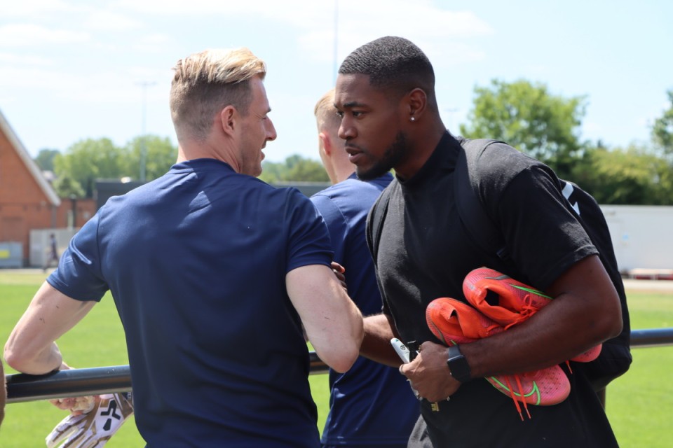 Craig MacGillivray and Chuks Aneke shake hands