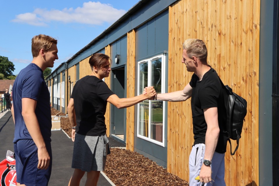 George Dobson and Craig MacGillivray shake hands