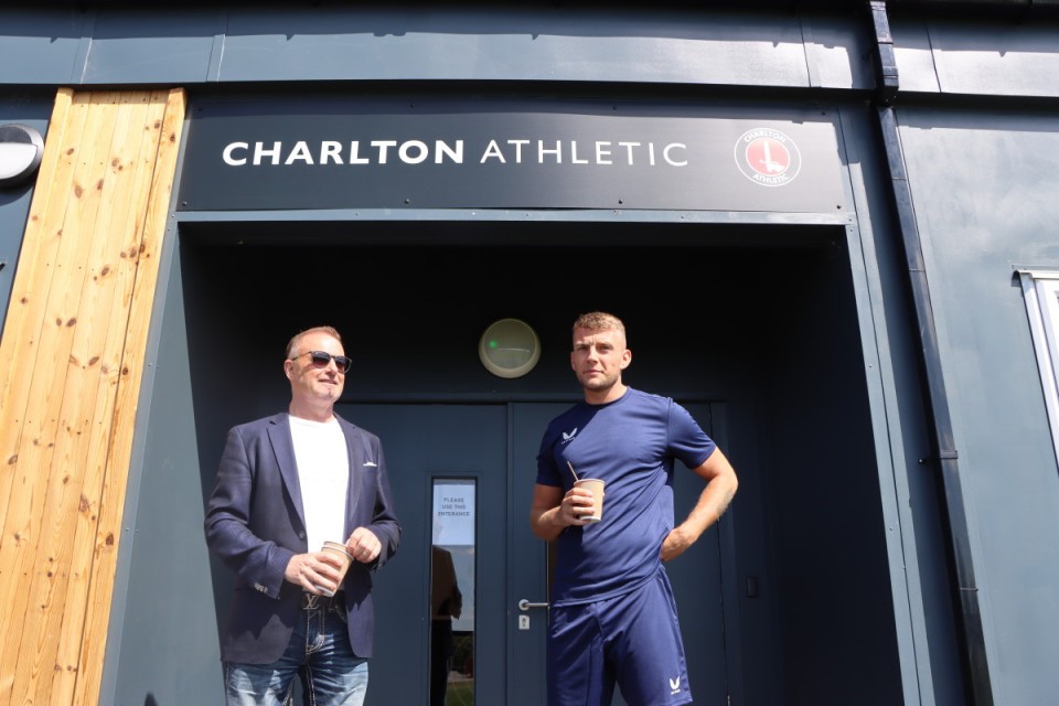 Thomas Sandgaard chats to Sam Lavelle at the training ground