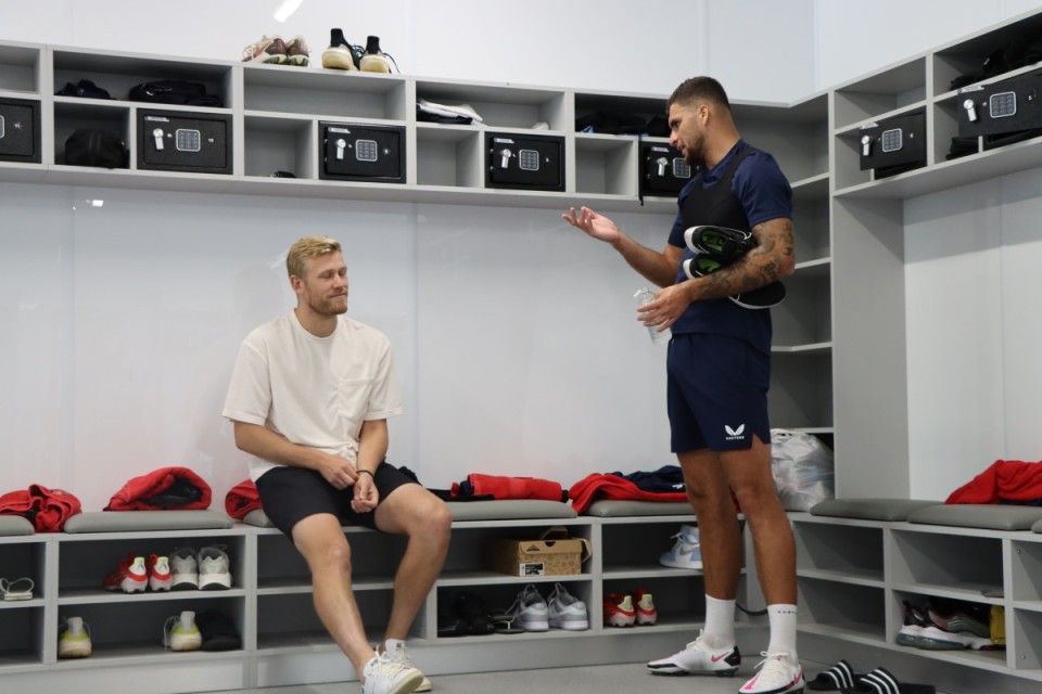 Jayden Stockley and Ryan Inniss catch up in the dressing room