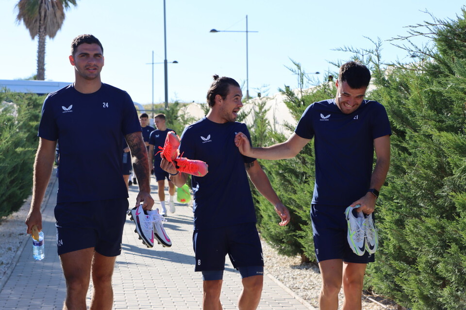 Jake Forster-Caskey and Scott Fraser share a joke