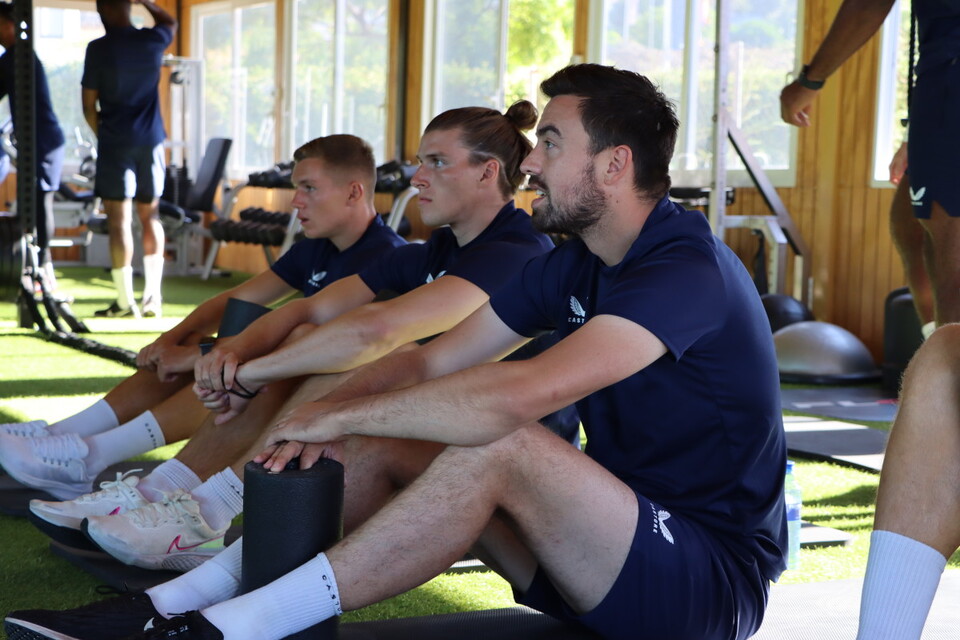 Eoghan O'Connell, Josh Davison and Charles Clayden in the gym