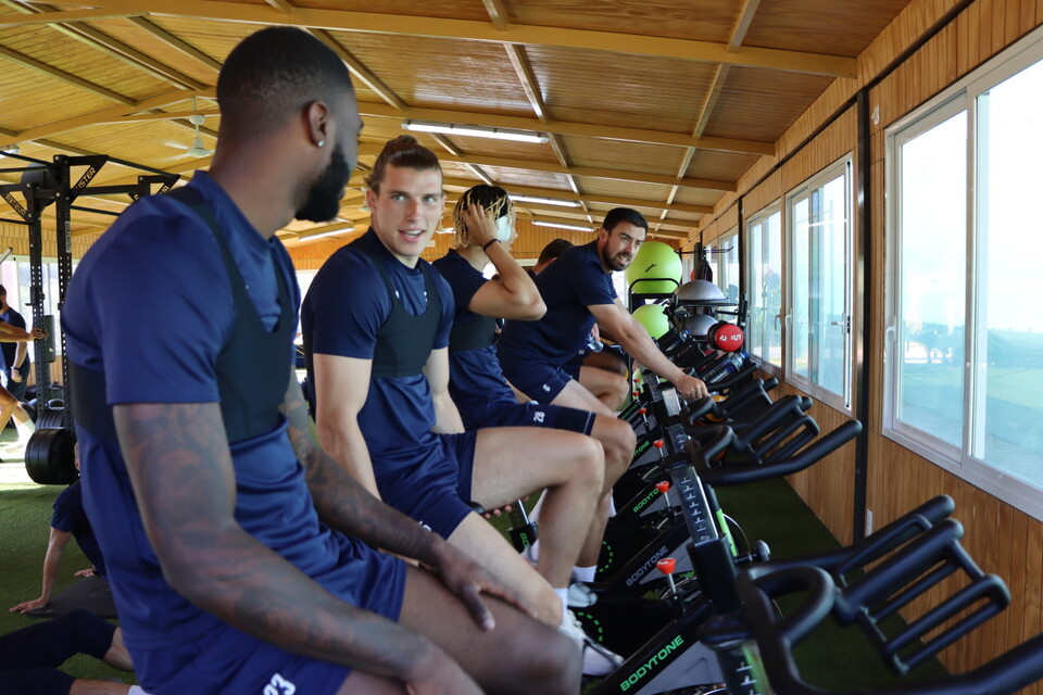 Charlton players warm using the exercise bikes
