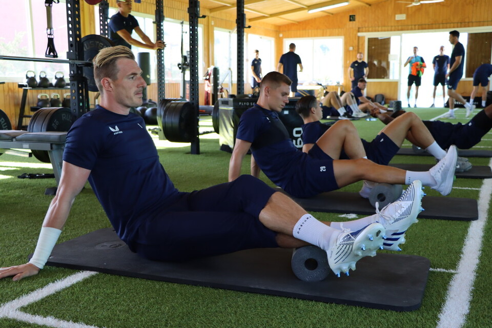 Craig MacGillivray, Charles Clayden and George Dobson using the foam rollers