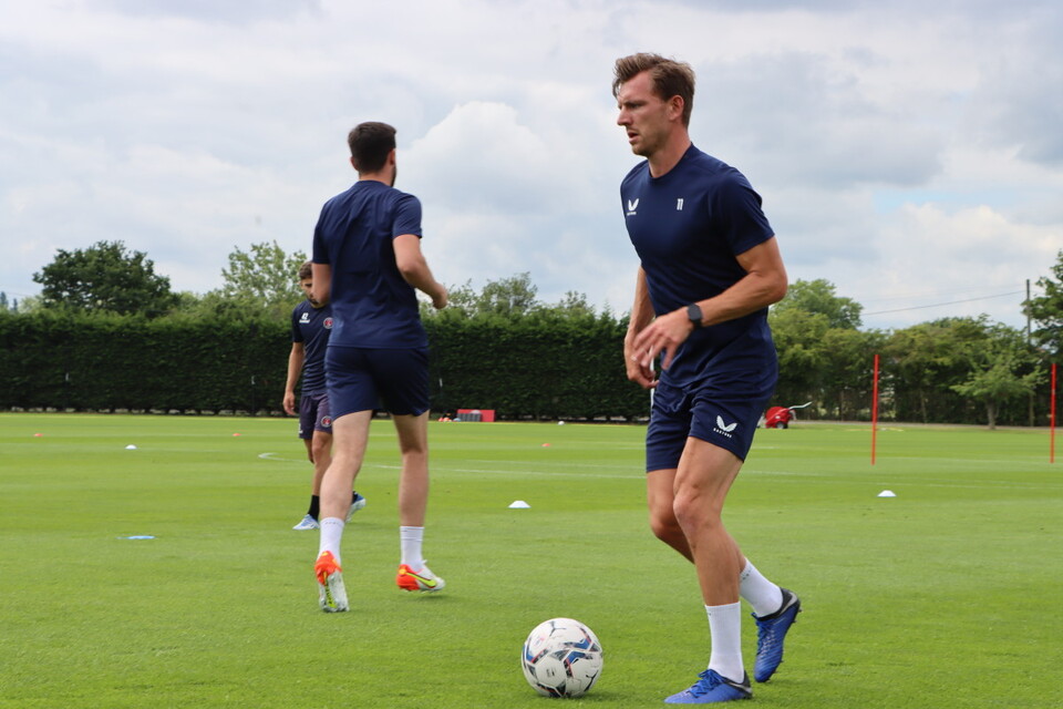 Alex Gilbey dribbling with the ball