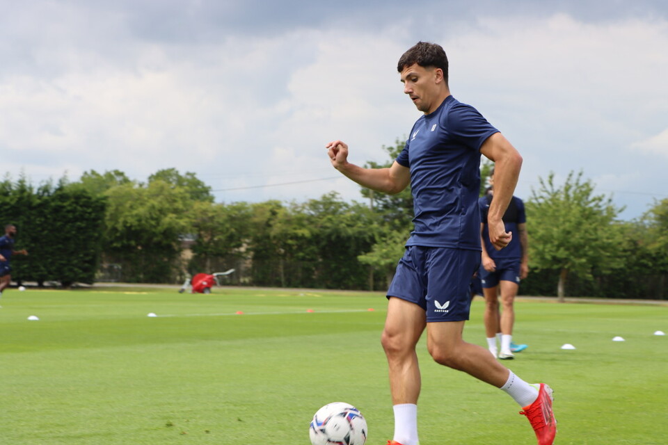 Albie Morgan dribbling with the ball
