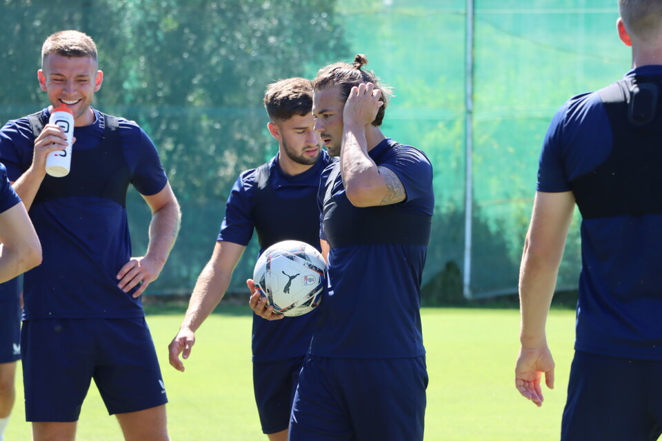 Jake Forster-Caskey with a ball in his right hand during pre-season training