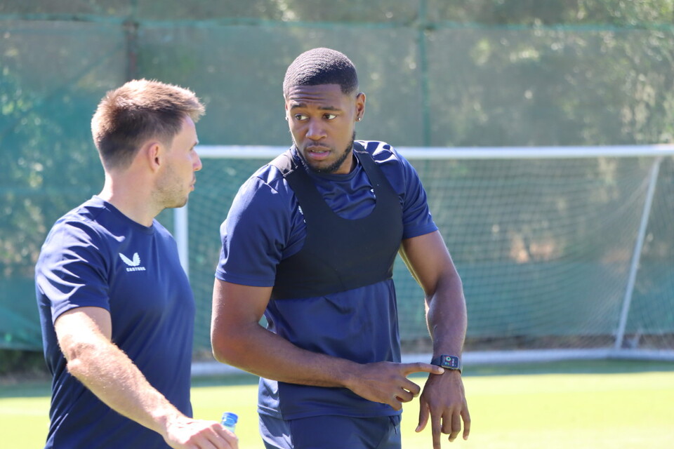 Chuks Aneke chats to Adam Coe, Head Physiotherapist