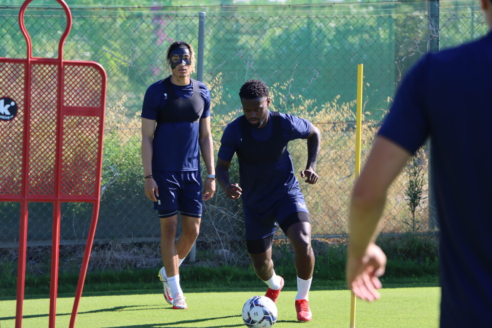 Diallang Jaiyesimi receives the ball during a drill
