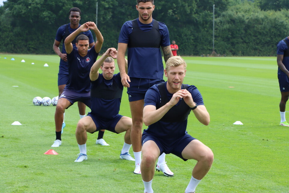 The Addicks squad performing squats at Sparrows Lane