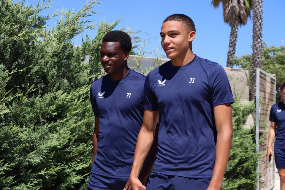 Deji Elerewe and Miles Leaburn walking back to the team's hotel
