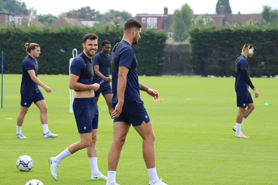 Scott Fraser in conversation with teammate Ryan Inniss