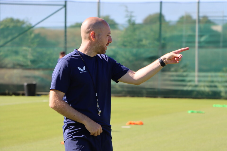 Ben Garner instructs his players during pre-season training