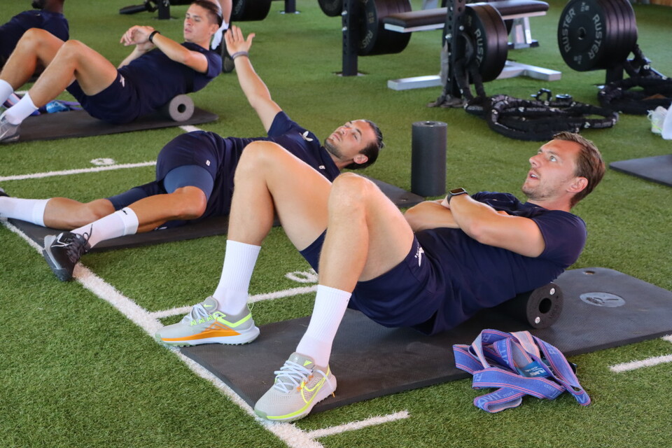 The Addicks squad using foam rollers in the gym
