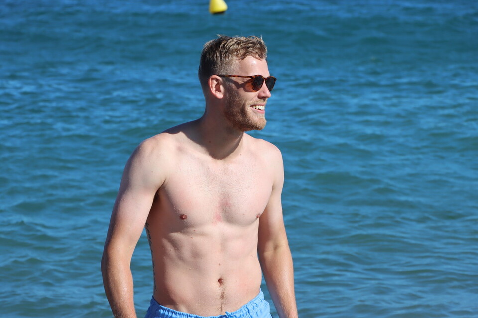 Jayden Stockley smiles while in the Spanish sea