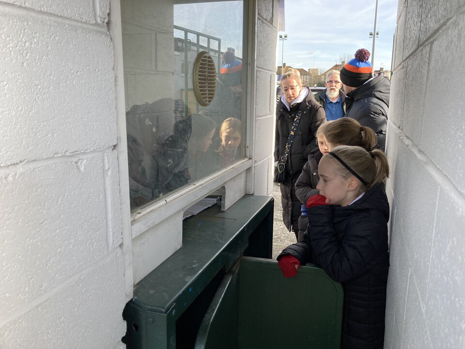 Bexley volunteers serving fans at the turnstiles
