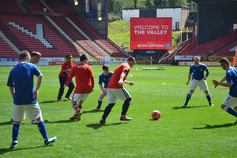 EITC and Upbeats playing football