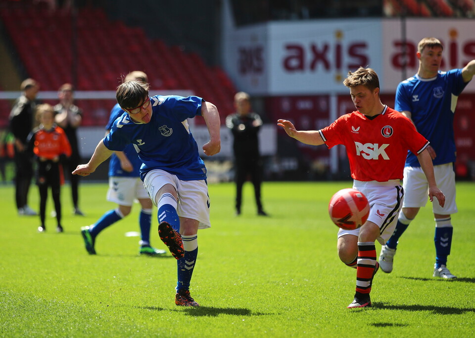 EITC and Upbeats playing football